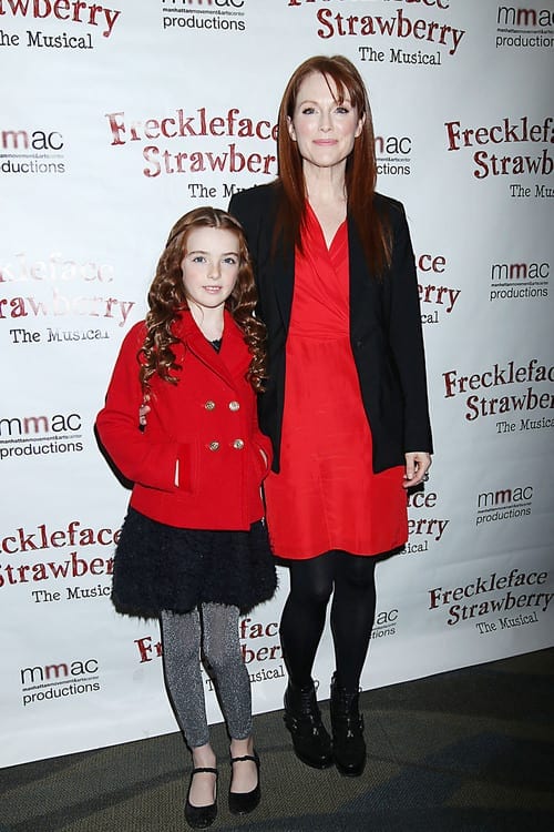 ulianne Moore poses with daughter Liv at the Manhattan Movement & Arts Center's family performance of "Freckleface Strawberry" to benefit 'Save The Children' in New York