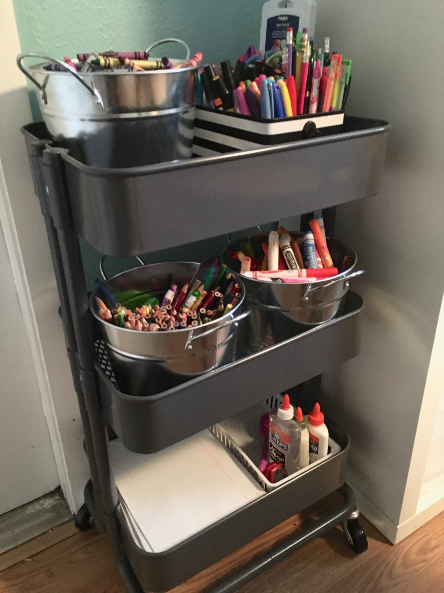 Easy Art Organization Using an Ikea Utility Cart - Modern Day Moms